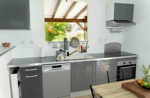 Point d'Or Casa | Homerez - Casa acogedora en Les Abymes con jacuzzi relajante