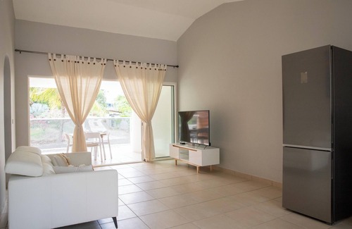 Sainte-Anne Casa | Homerez - Casa acogedora con spa y sauna en Sainte-Anne