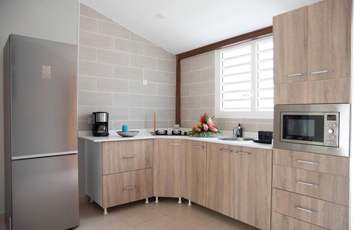 Sainte-Anne Casa | Homerez - Casa acogedora con spa y sauna en Sainte-Anne