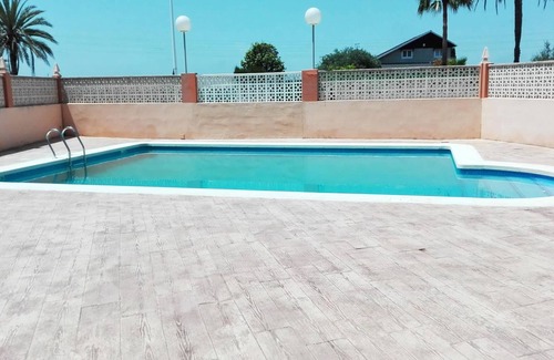 El Perelló Casa | Homerez - Casa a 1 km de la playa para 7 pers. con piscina compartida y jardín