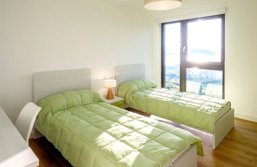 Outes Casa | Homerez - Casa a 3 km de la playa para 9 pers. con piscina y jardín en Outes