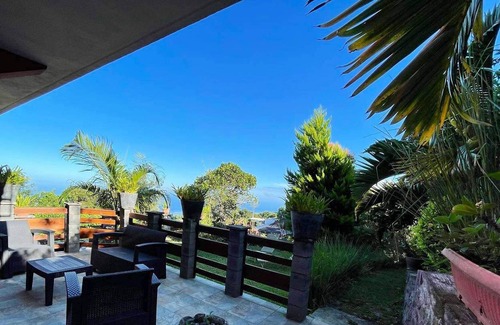 Trois-Bassins Casa | Homerez - Casa a 7 km de la playa para 3 pers. con jardín en Trois Bassins