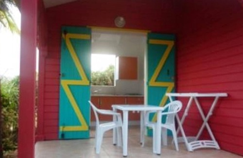 Sainte-Rose Casa | Homerez - Casa para 2 pers. con piscina compartida y jardín en Sainte-Rose