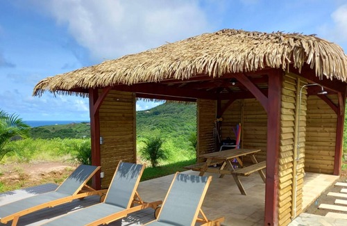 Le Marin Villa | Homerez - Villa para 8 pers. con piscina, jacuzzi y vistas al mar en Le Marin