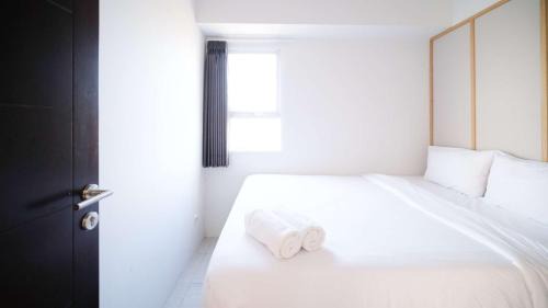 Sidoarjo Apartamento | Homey and Comfy 2BR Apartment at Suncity Residence By Travelio