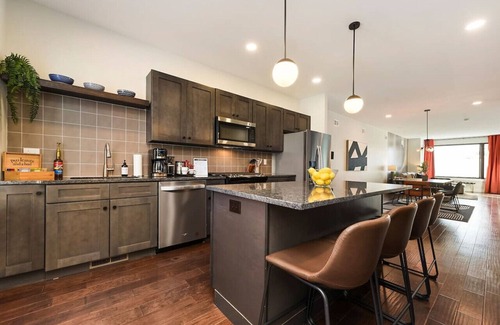 Central Northside Casa | ★ HostWise Stays ★ 3 King Beds! Garage! Theater! Great Location!