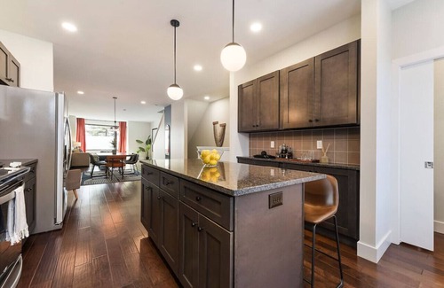 Central Northside Casa | ★ HostWise Stays ★ 3 King Beds! Garage! Theater! Great Location!