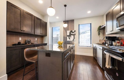 Central Northside Casa | ★ HostWise Stays ★ 3 King Beds! Garage! Theater! Great Location!