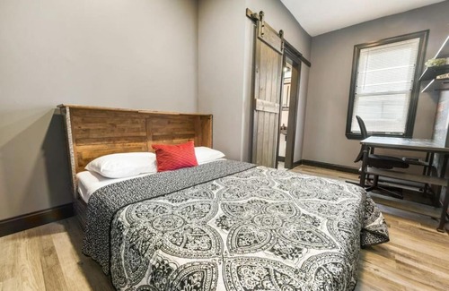 Lawrenceville Casa | HostWise Stays - Prime Location in Lawrenceville, Exposed Brick 2BR Home