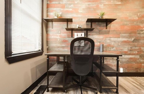 Lawrenceville Casa | HostWise Stays - Prime Location in Lawrenceville, Exposed Brick 2BR Home