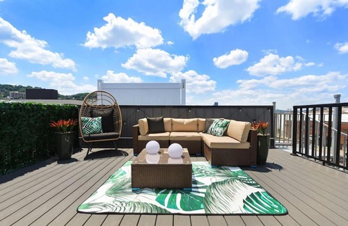 Lower Lawrenceville Casa | HostWise Stays - The Charlotte - Rooftop patio, Garage Parking, Prime Location, Large 3 Story Home