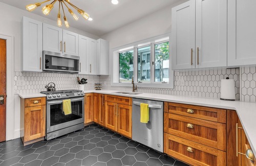 Burns Park Casa | Hot Tub | Theater | Sauna | Deck | Fire Pit | Walk to Stadium/Downtown/Park