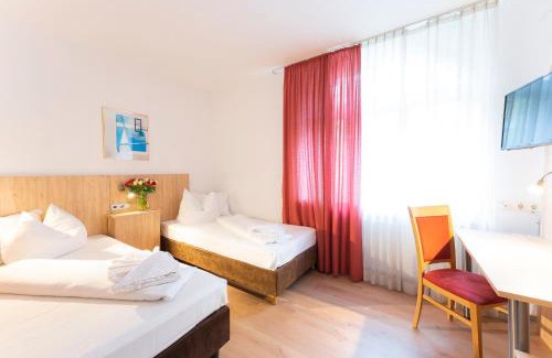 Ostheim Hotel | Hotel Astoria am Urachplatz