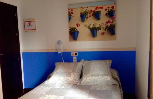 La Trinidad-San Juan y Todos los Santos Casa | HOTEL BOUTIQUE ALMA ANDALUSí