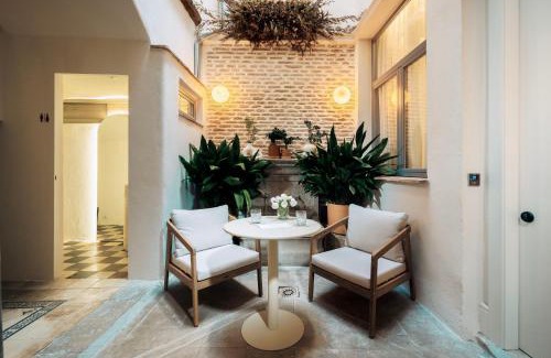 Distrito Central Hotel | Hotel Boutique Escudo del Carmen