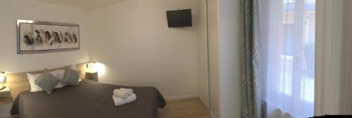 Quartier Saint-Ambroise Apartamento | Hotel De L'Horloge