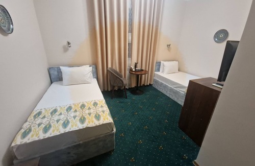 Itchan Kala Cama Y Desayuno | Hotel Kuvonchoy Bonu