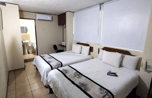 León Hotel | Hotel Mateos 1215
