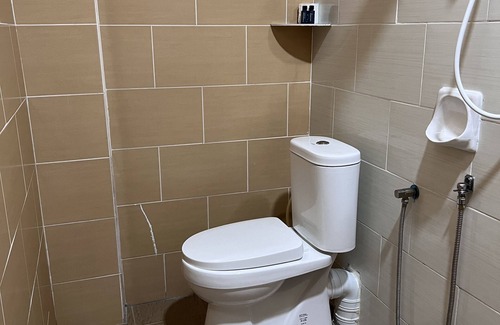 Kuah Hotel | OYO 90907 Brick Cottage Homes
