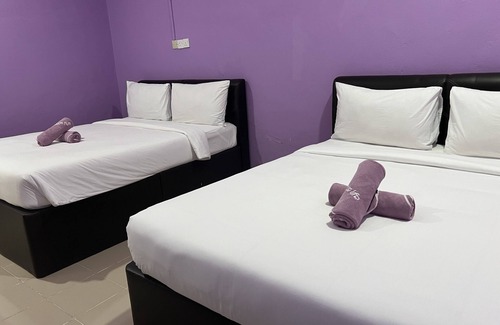 Kuah Hotel | OYO 90907 Brick Cottage Homes