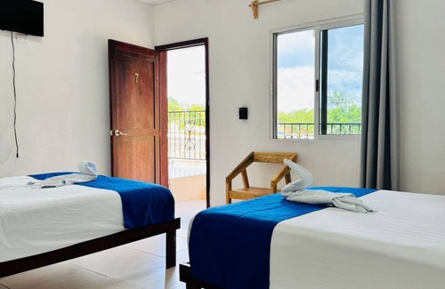 Izamal Hotel | Departamentos Rodriguez