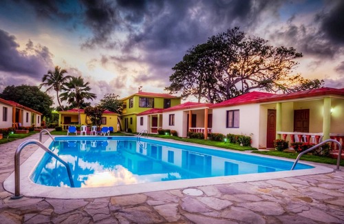 Cabarete Apartamento | Hotel room with pool, TV, safe, internet near sandy beach