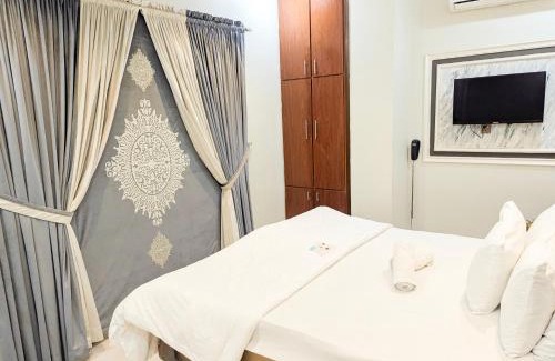 Gulshan-E-Jamal Cama Y Desayuno | Hotel StayInn - Millennium Mall Branch