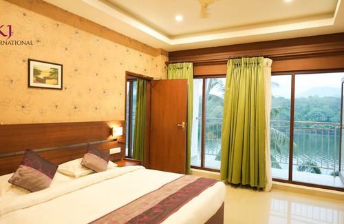 Kuttampuzha Complejo | HOTEL VKJ INTERNATIONAL