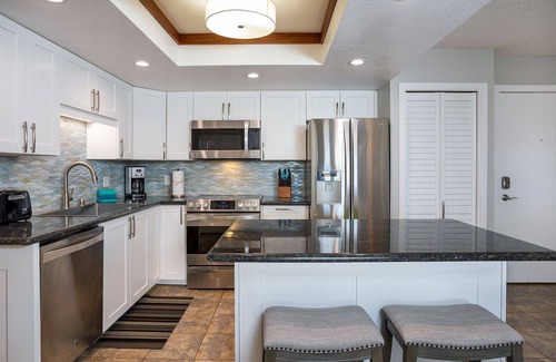 Kihei Condominio | Maui Banyan remodelado de arriba piso de la unidad Pasos a la playa, Tiendas