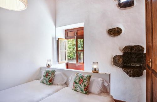 Tajaste Casa | Hotelito Rural Flor de Timanfaya