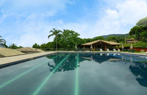 Veloso Casa | Casa em condomínio com lazer perto da praia