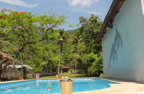 Recreio dos Bandeirantes Casa | Casa en la habitación piscina Recreación y pequeños eventos.