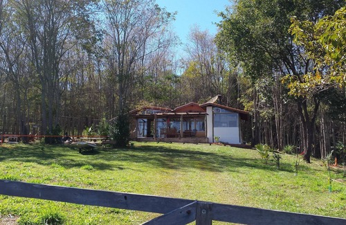 Delfinopolis Cabaña | Casa en el bosque, rodeada por el Río Grande y vista deslumbrante de la puesta del sol.