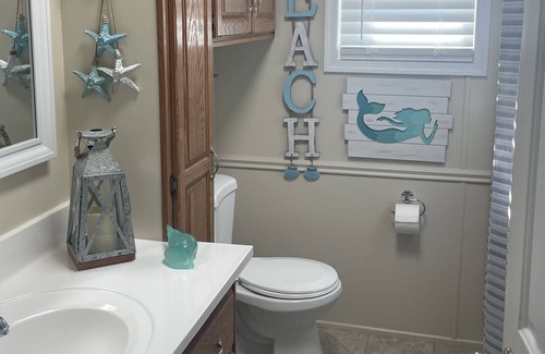 Assateague Pointe Casa | The Corona House es una casa unifamiliar ubicada en un gran estanque