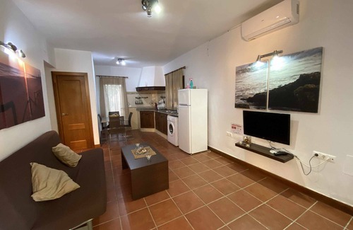 El Palmar Casa | Casa con jardín privado y piscina compartida