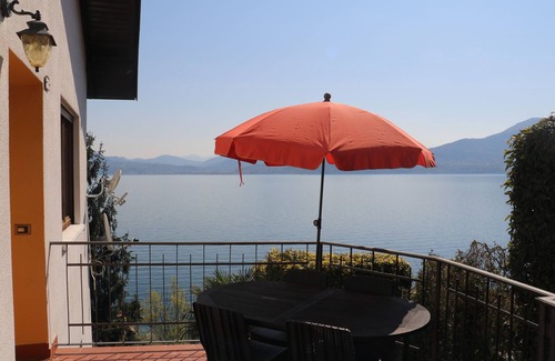 Resiga Apartamento | Casa con terraza privada y hermosa vista al lago.