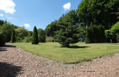 Marum Chalet De Esquí | Houten chalet wat direct aan het bos gelegen is