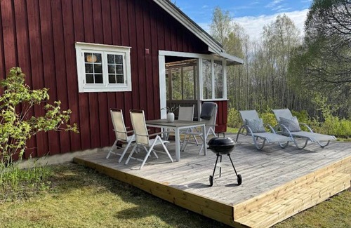 Bredsjo Casa | Hus Björklund - Holiday home with sauna, fireplace & boat in the countryside