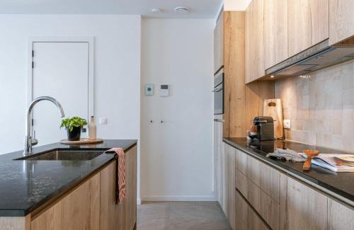 Nieuwpoort Apartamento | Huswell - Nice apartment with pool, parking & private spa