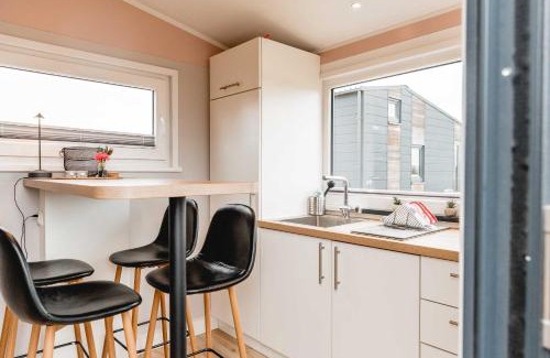 Grasberg Casa | Huxfeld-Hof - Tiny-House KUHni