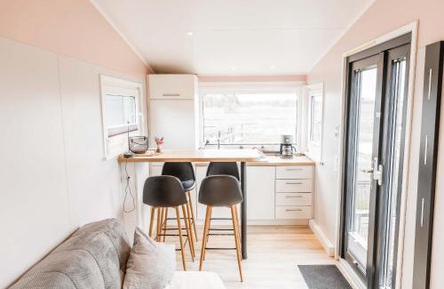 Grasberg Casa | Huxfeld-Hof - Tiny-House KUHni