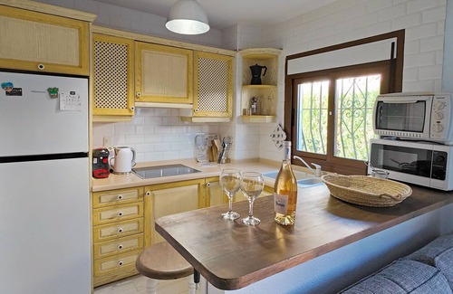 Molinell Chalet De Esquí | Ibiza-style vacation home with terrace right on the beach. Great pools.