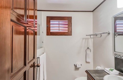 Damas Condominio | Ideal Tropical Retreat W/ Private Patio, Shared Pool, Lush Gardens & More!