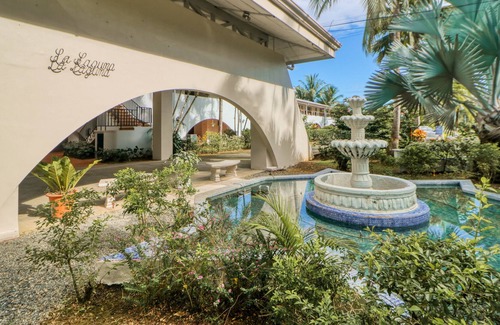 Damas Condominio | Ideally Located Tropical Escape W/ Lush Gardens, & Shared Pool!