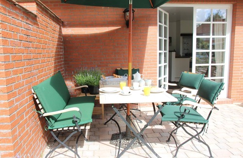 Greetsiel Apartamento | Idyllic, quiet garden apartment for 2-4 people in the middle of Greetsiel