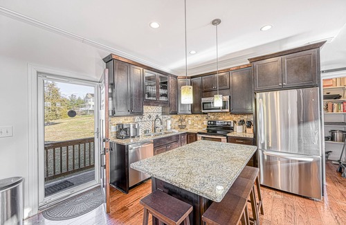 Livingston Casa | Impressive lakefront home with private dock, 2 boat slips, firepit, deck, grill