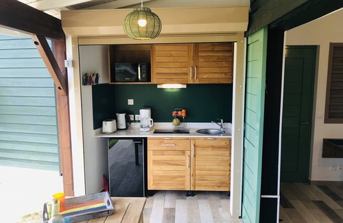 Bouillante Casa | En Guadalupe en Bouillante Bungalow, el lobo blanco de las cabañas encaramadas