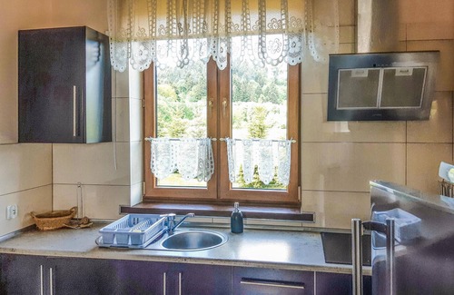 Lesko Casa | In the idyllic south of Poland, this cozy vacation home welcomes you in Lesko.