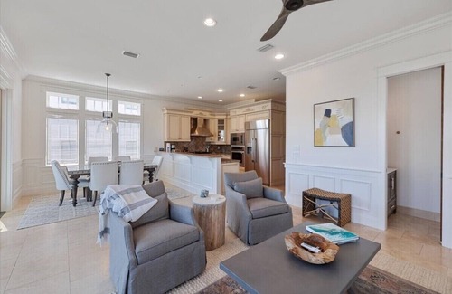 SeaNest Village Casa | includes golf cart! SeaNest stunner with Gulf views, 4 adult bikes. EV charger