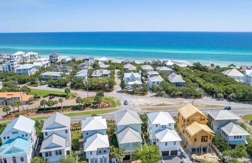 SeaNest Village Casa | includes golf cart! SeaNest stunner with Gulf views, 4 adult bikes. EV charger